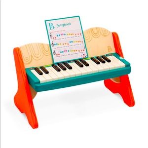 B. toys wooden toy piano.